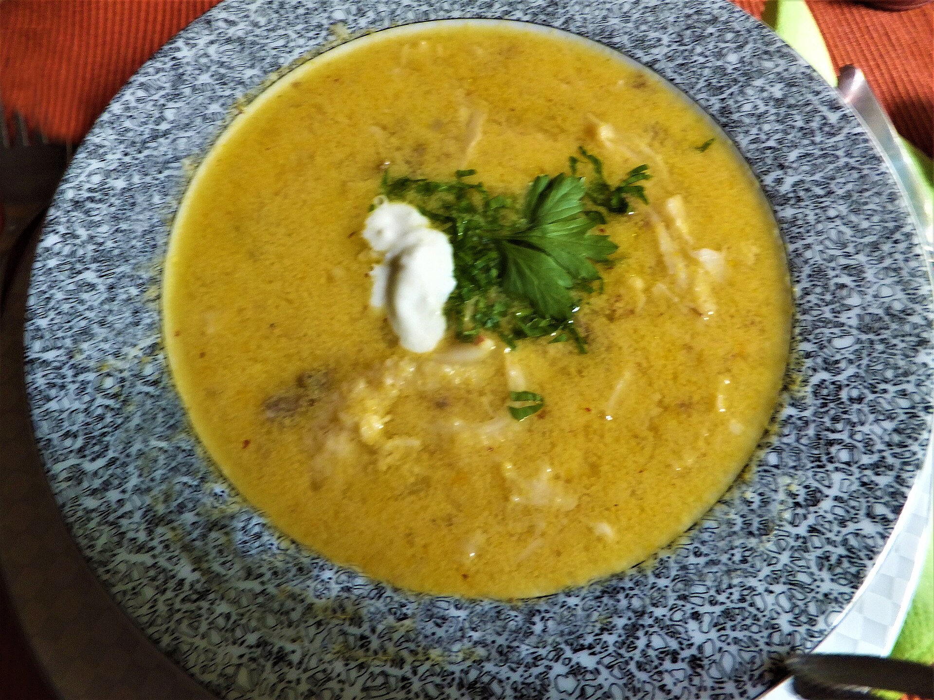 Tripe soup with sour cream and parsley