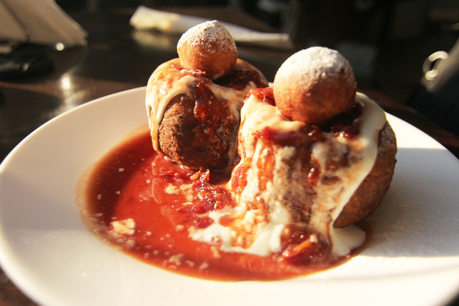 Papanași with sour cream and jam